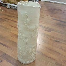 White porcelain vase with floral fantasy imprint