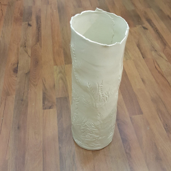 White porcelain vase with floral fantasy imprint