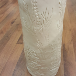 White porcelain vase with floral fantasy imprint