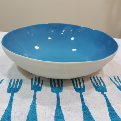 Porcelain bowl with azure background